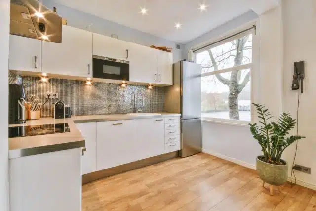 bright kitchen interior with wood floors and appli 2026 03 18 08 17 39 utc | Pacific Bay Construction