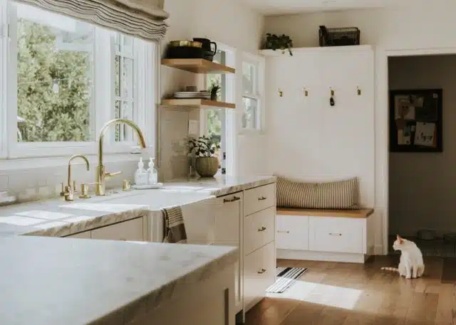 bright kitchen with marble countertops and wooden 2026 03 18 10 53 18 utc | Pacific Bay Construction